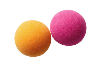 Two vibrant, textured spheres, one orange and one pink, positioned close together against a black background