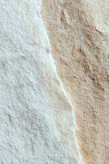 Dreamy vertical paper texture with folds and cream tones in abstract design