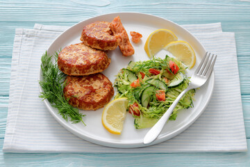 Hot Smoked salmon burgers, patties and coleslaw