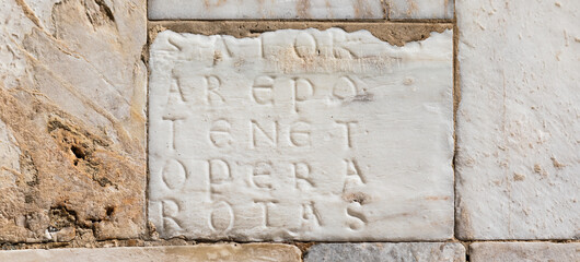 Facade of Siena Cathedral, Italy. The magic Sator square, esoteric word, Latin palindrome