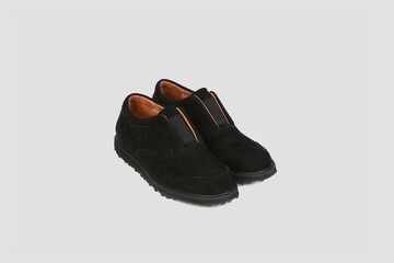 pair of black leather shoes