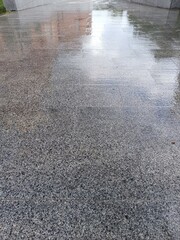 Background of wet marble paving slabs