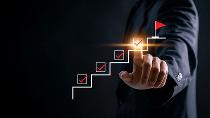 Step by step progress and goal completion concept. businessman pointing at checklist. business...