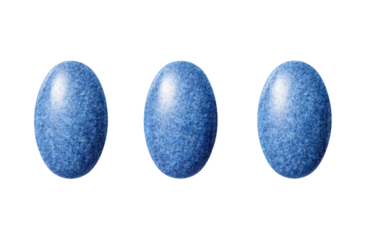 Three oval, smooth, light-blue stones or gems, arranged horizontally.  They appear polished, with a slightly textured surface