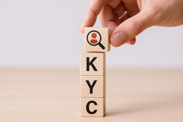 Hand stacking wooden blocks with icons and letters spelling fitness and health concepts on a light background