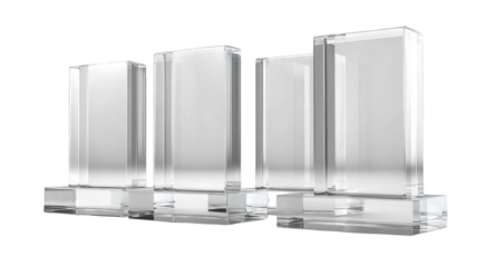 Four gleaming silver trophies, a celebration of achievement and success against dark backdrop.