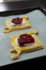 Puff pastry with jam and cream cheese. Dessert. Pastries. Food concept