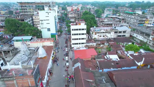 Aerial View of Urban Town Street with Dense Buildings and City Life &ndash; 4K Drone Footage