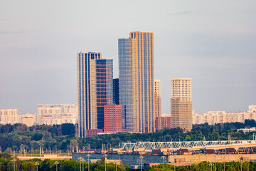 Colorful urban landscape with tall residential skyscrapers