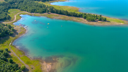 Plastiras Dam, an arch dam in the Karditsa regional union of Greece, which flows into the Tavropos River, forming the artificial Plastiras lake.