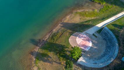 Plastiras Dam, an arch dam in the Karditsa regional union of Greece, which flows into the Tavropos River, forming the artificial Plastiras lake.