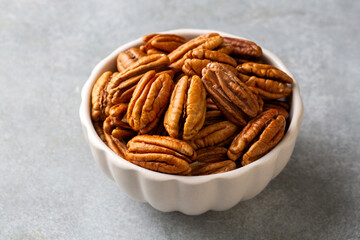 Tasty pecan nuts in bowl