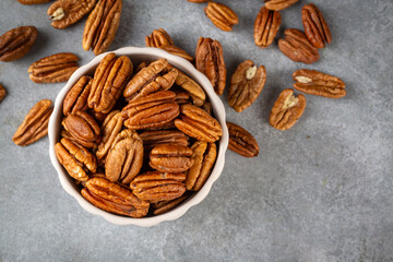 Tasty pecan nuts in bowl