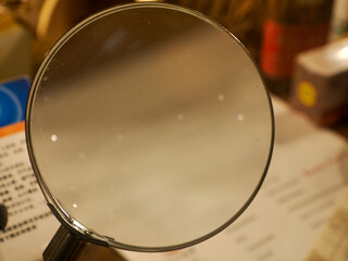 old magnifying glass detail close up