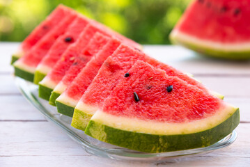 Fresh sliced watermelon outdoors, delicious summer snack