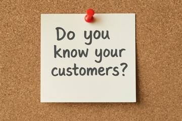 Note with “Do You Know Your Customers” on Cork Board