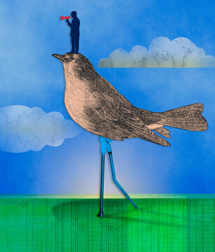 Man shouting through megaphone standing on top of bird with metal legs