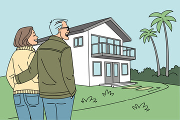 real estate agent with a house