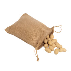 Boiled peanut fly explosion, boiled peanut bean fall down pour in sac bag. Tropical boiled peanut throw in air. White background Isolated high speed shutter, freeze action