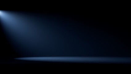 Bright blue light beam illuminating dark studio floor image