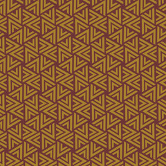 A seamless geometric pattern featuring yellow and brown triangles. Ideal for ethnic backgrounds, fabric motifs, packaging, and wallpaper.