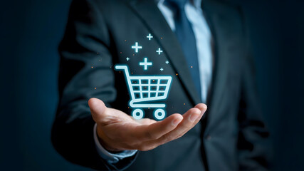 Businessman elegantly presents glowing shopping cart icon with digital sparks, symbolizing e-commerce growth and online retail success