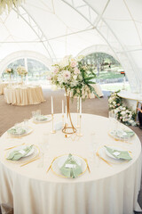 Luxury, elegant wedding reception table arrangement, floral centerpiece
