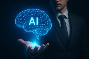 Artificial intelligence brain hologram glowing in businessman hand representing modern ai technology development and futuristic digital innovation network interface concept