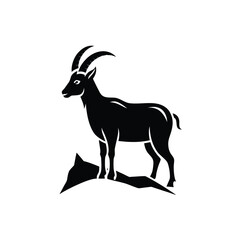 Silhouette a mountain goat standing on rocks animal