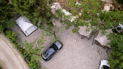 Aerial View of Car Parked in Forest Campground, Sichuan Province, China