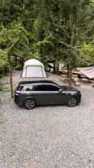 Aerial View of Car Parked in Forest Campground, Sichuan Province, China