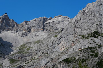 Imposing Craggy Alpine Mountain Peaks Under a Deep Blue Sky