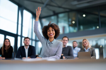 Successful business professionals working together in a corporate office meeting with a smiling businesswoman
