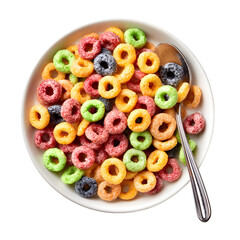A white bowl filled with colorful fruit flavored cereal loops and a silver spoon isolated on transparent background