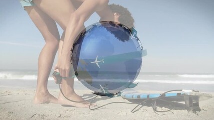 Surfer leaning down and grabbing ankle leash beside surfboard on beach, securing strap for surf - Powered by Adobe