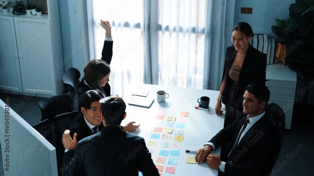 Wall mural top view of professional project manager present idea while diverse team putting hands together and 