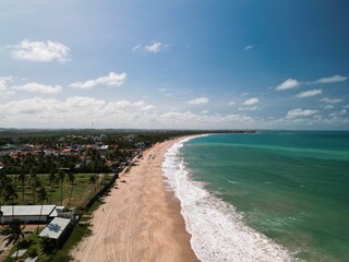 Aerial view of Pontal de Maraca&iacute;pe in Porto de Galinhas, Brazil, with crystal clear sea, natural pools, jangada boats and paradise beach in the northeast coast &ndash; drone photography