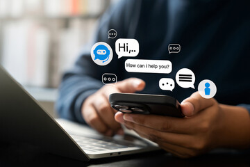 A businessman using an AI chatbot for replying to clients, AI helps businesses to communicate easily. 