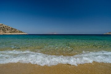 View of the breathtaking turquoise beach of Agia Theodoti in Ios Greece