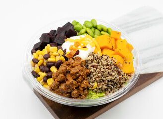 Thai Plant-Based Beef Wholesome Bowl with quinoa, edamame, corn, black beans, diced beets, and butternut squash top view of Nutritious Meal