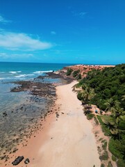 Aerial view of Praia da Pipa and Chapad&atilde;o cliffs in Pipa, Rio Grande do Norte, Brazil, showing paradise beaches, blue sea, and dramatic coastline &ndash; perfect summer destination