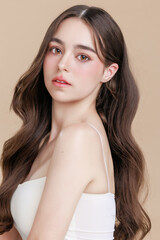 Naklejka premium Beautiful portrait Caucasian woman makeup of cosmetic on face smile attractive isolated on beige background.