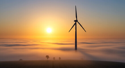 Obraz premium wind turbine sunrise fog renewable energy landscape