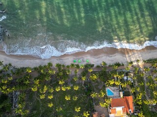 Aerial view of Coqueirinhos Beach in Jo&atilde;o Pessoa, Para&iacute;ba, Brazil &ndash; coastline, sand, blue sea, and tropical nature in South America