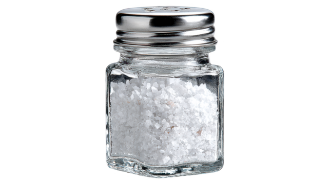 Closeup of a glass jar filled with sparkling salt crystals for culinary purposes