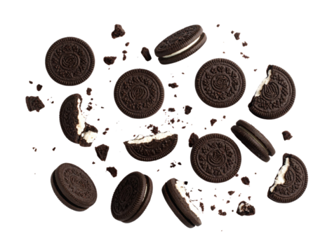 Top-Down View of Scattered Oreo Cookies and Broken Pieces in Motion, White Background Clipping Pathj