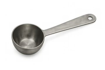 Stainless steel measuring spoon lying on a transparent background, perfect for precise cooking and baking