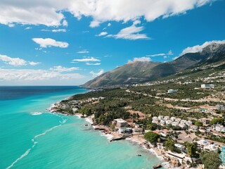 Aerial view of Dhermi Beach, Albania – turquoise sea, Mediterranean coastline, and paradise...