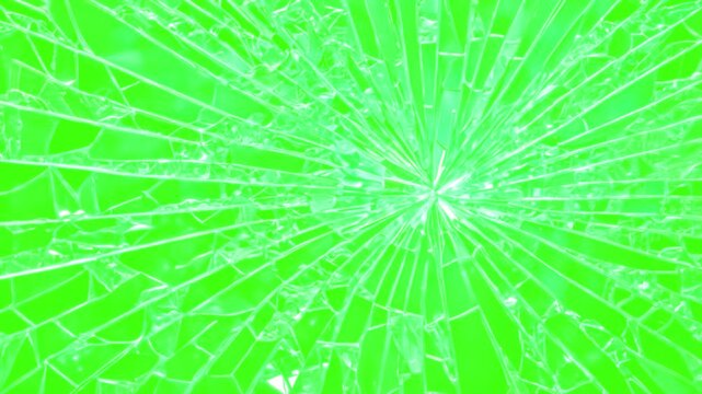 Glass Shattered and Breaks by Bullet Hit,  Super Slow Motion Shot of Real Glass Break. The glass break green screen background. footage of broken glass, with green screen in the background.