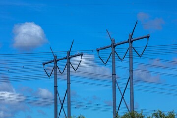 High voltage power lines and support poles